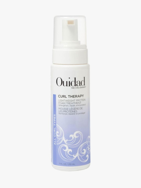Ouidad Curl Therapy Lightweight Protein Foam Treatment in branded component on a light gray background