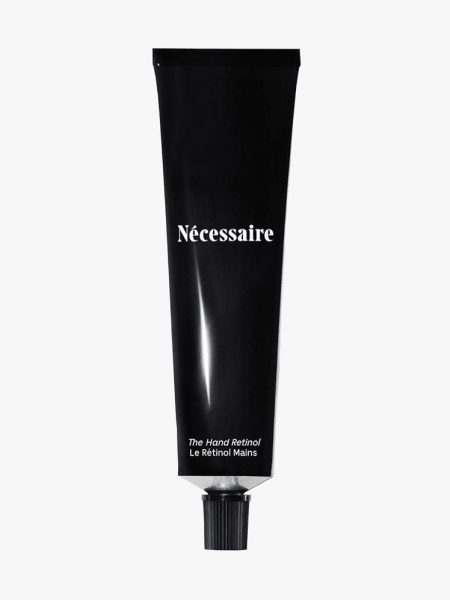 Nécessaire The Hand Retinol in branded tube component on a light gray background